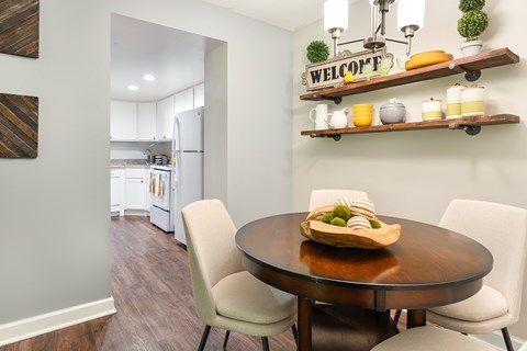 Convenient dining area offset from the kitchen, offering a functional and flexible layout.