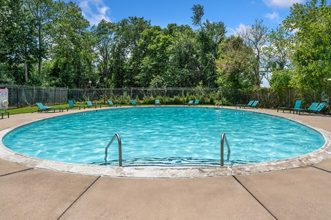 Residents enjoy a refreshing pool, fitness center, and planned community events.
