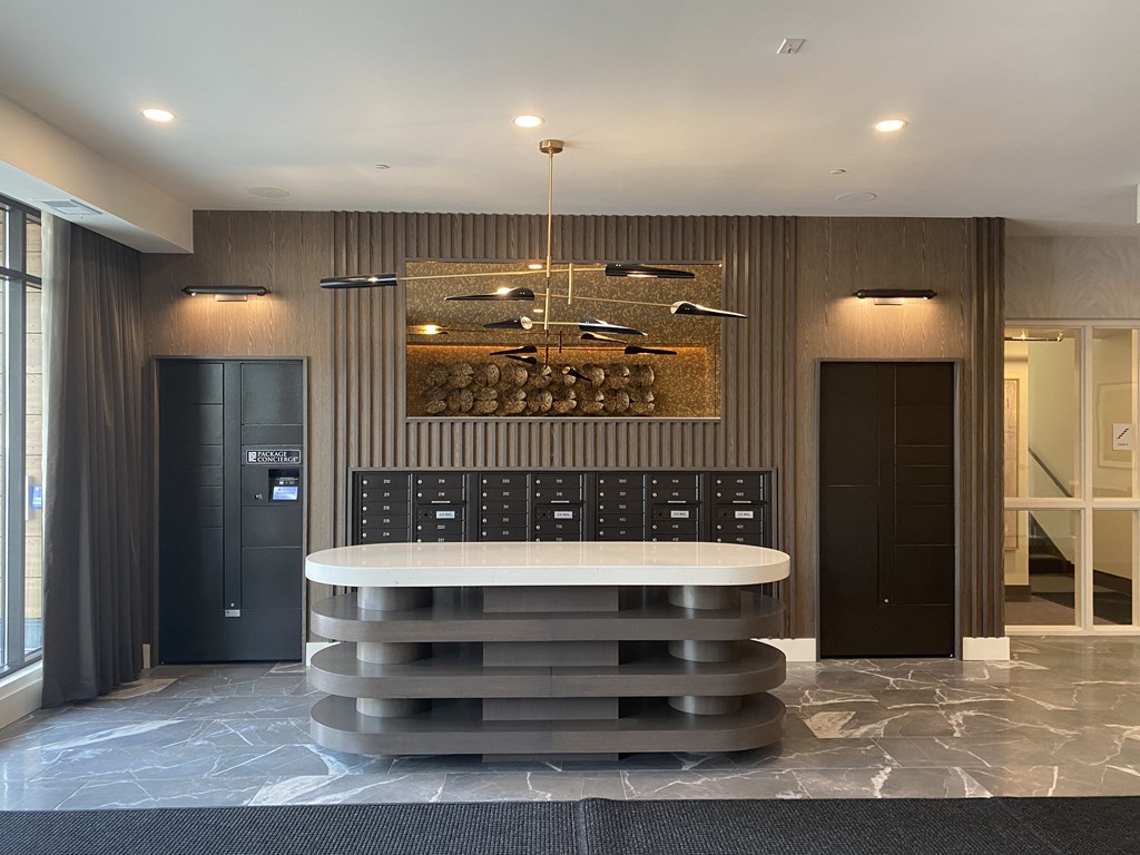 a modern and funky half bathroom reveal with black and white tile in a modern laundry space