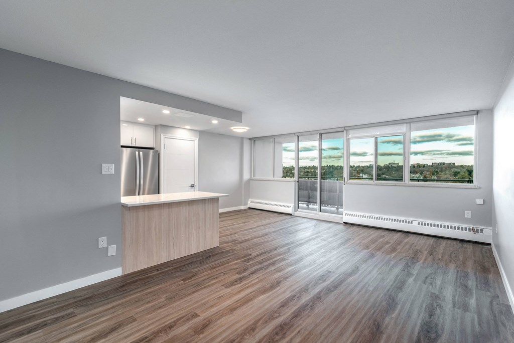 Open concept living room and dining room open to a kitchen