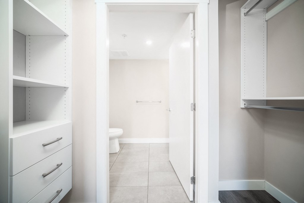 Walkthrough closet with plenty of storage space