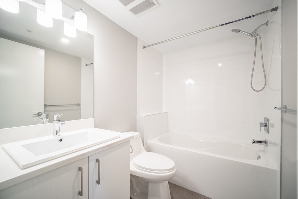 Pristine, well-lit bathroom