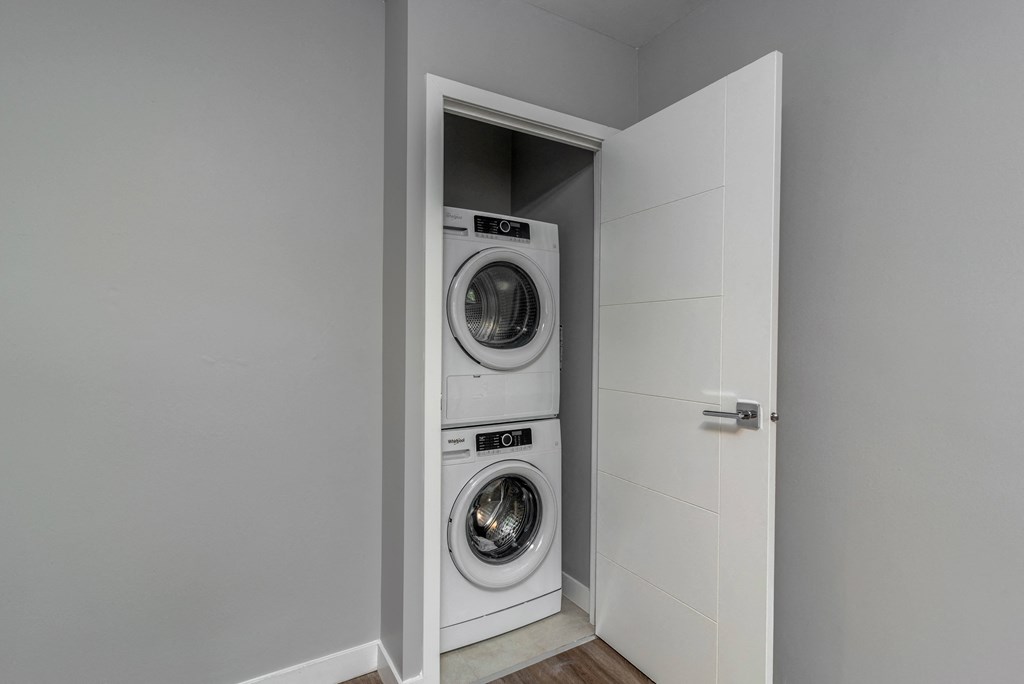 Stacking washer dryer in hallway closet
