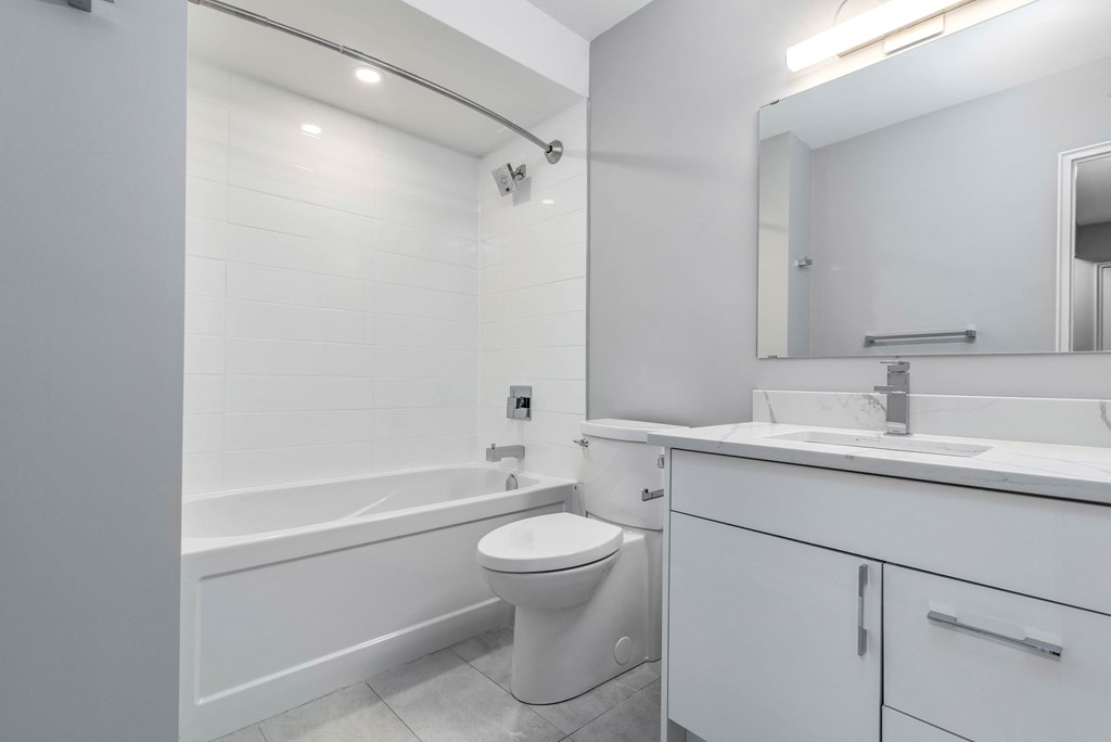 Bathroom with tub, toilet and vanity