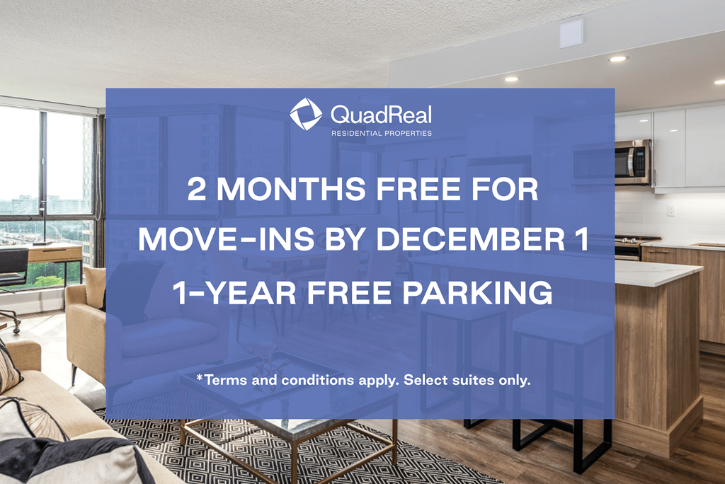 A room with a kitchen area and a sign advertising free move-in and parking.