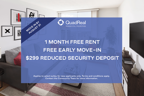 A room with a QuadReal advertisement offering a free month's rent and a reduced security deposit.