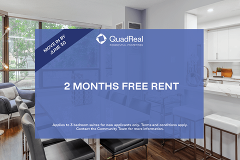 A room with a sign that says "MOVIE IN BY JUNE 30" and "2 MONTHS FREE RENT" from QuadReal.