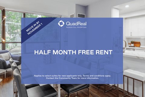 A room with a sign that says "Half Month Free Rent" in front of a window.