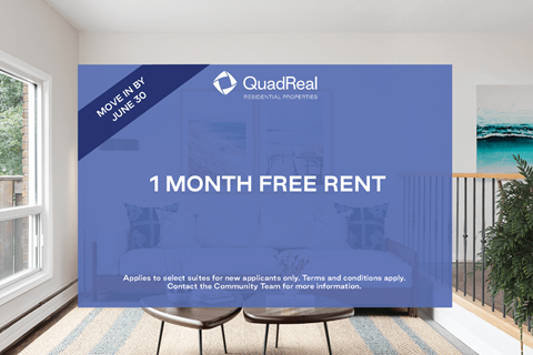 A room with a QuadReal advertisement for a free one month rent.