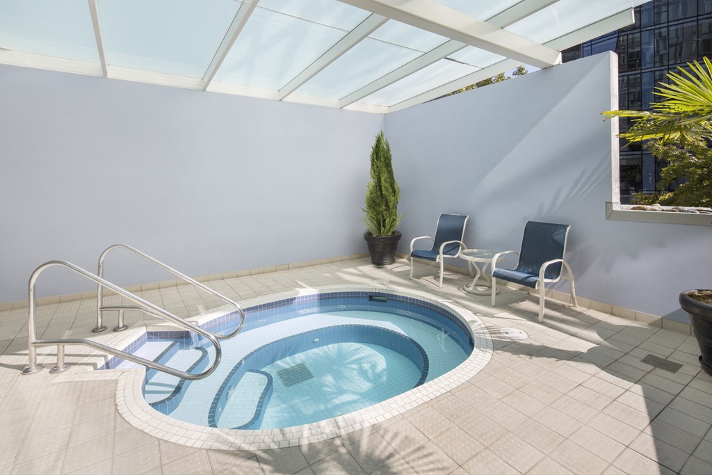 The hot tub is outdoor but undercover, perfect for Vancouver weather.