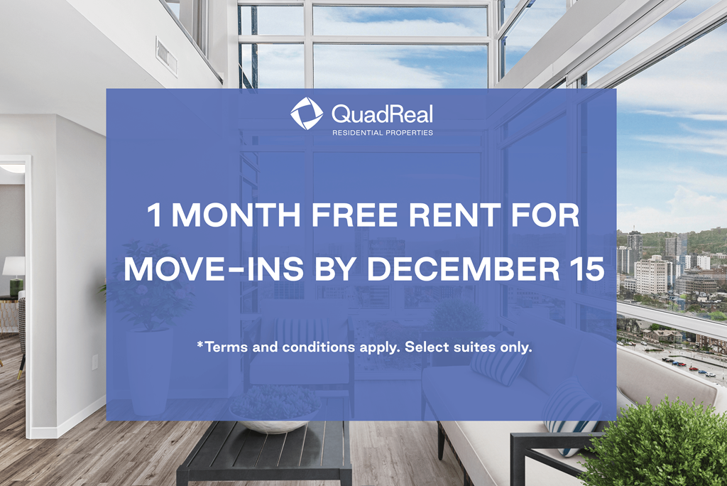 A QuadReal advertisement offering a free month's rent for move-ins by December 15.