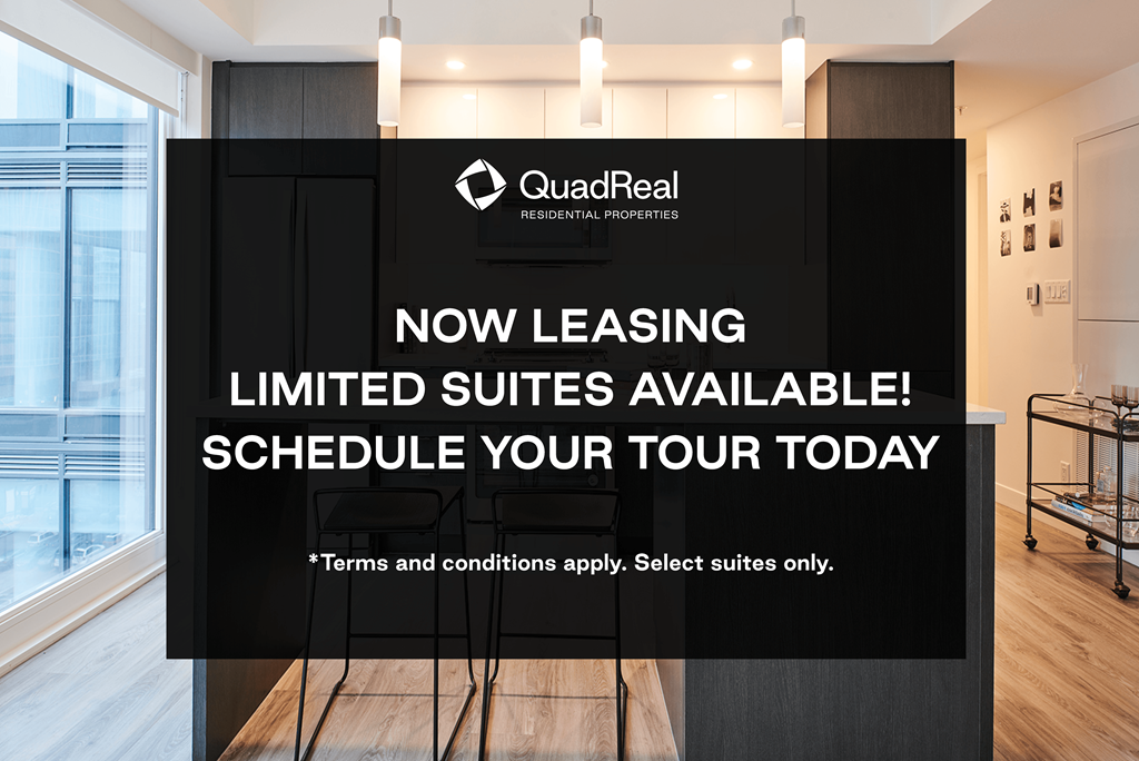 A sign advertising limited suites available at QuadReal Professional Properties.