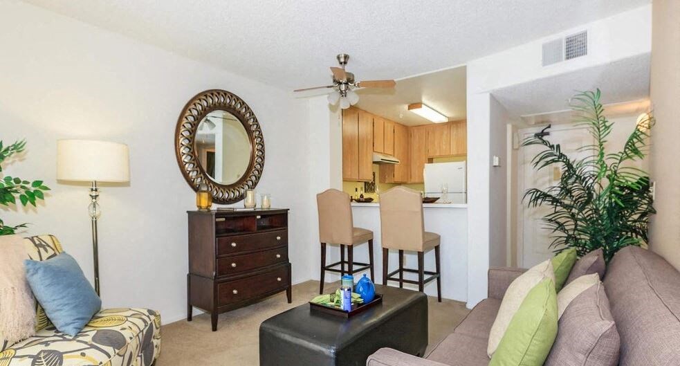 Living room with cabinet, couch at Loma Linda Springs, Loma Linda
