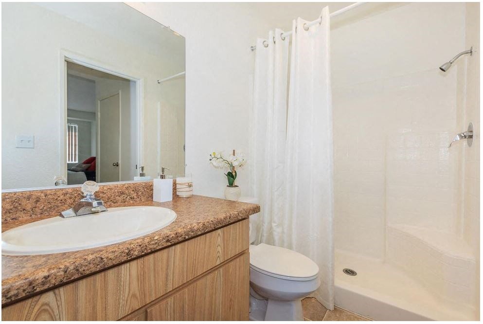 a bathroom with a sink toilet and a shower at Riverview Springs, California