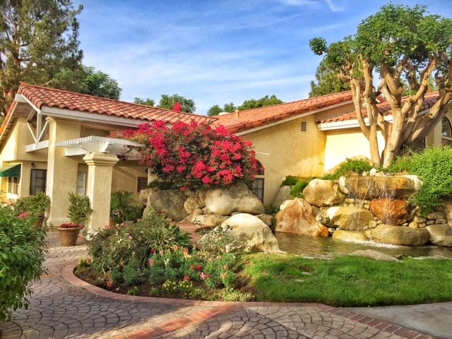 a house with a pond in front of it at Victoria Springs, Riverside, CA 92504