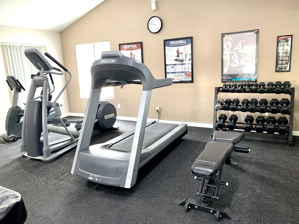 a gym with treadmills and other exercise equipment at Victoria Springs, Riverside, CA 