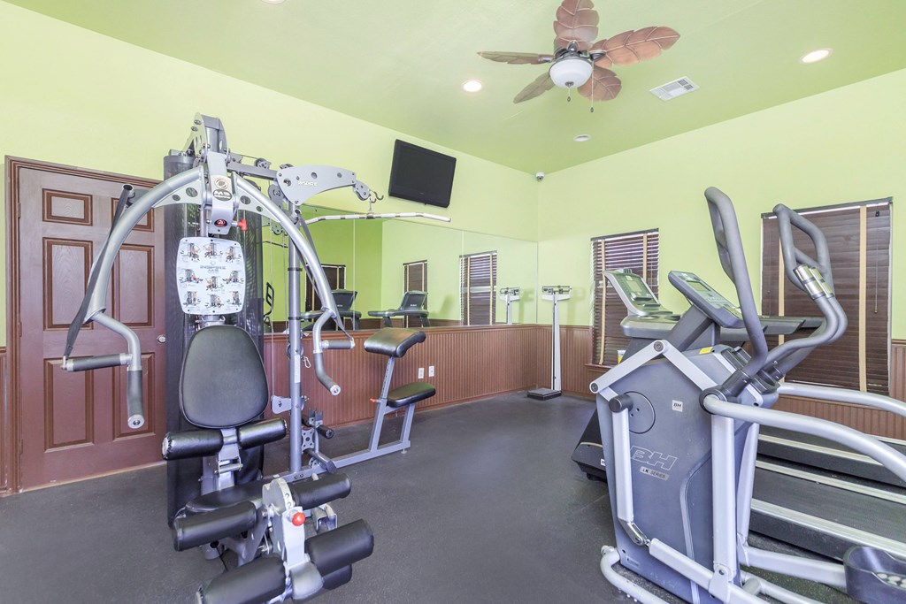 a gym with plenty of cardio equipment at The Villages at Lost Creek, San Antonio, TX 78247