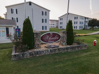 Sign Wheeler Estates Apartments 134 McEntire Lane, Decatur, AL 35603