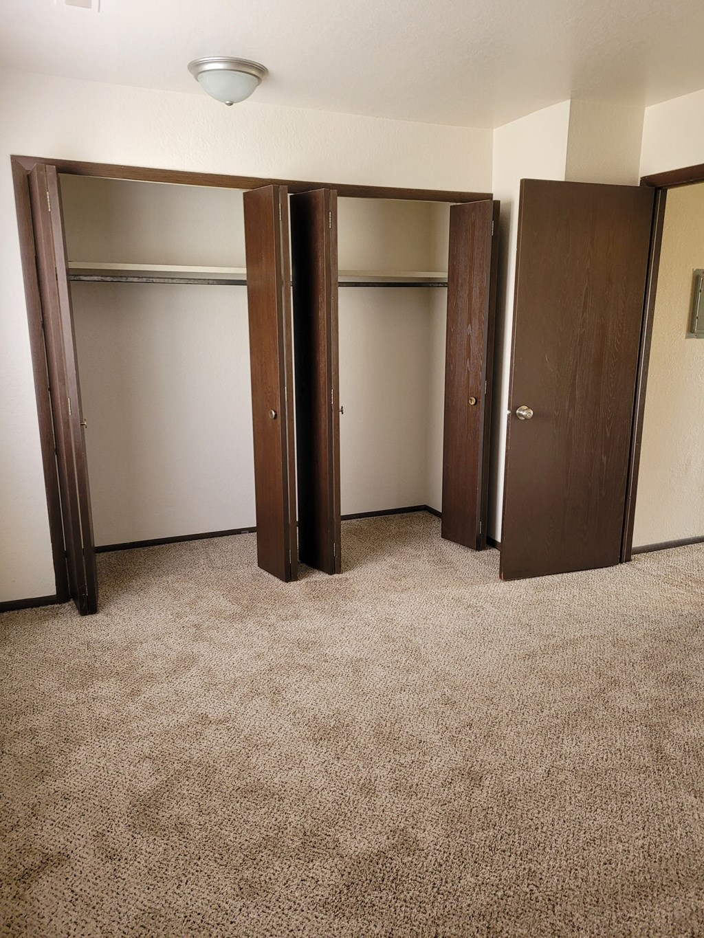 an empty room with four doors