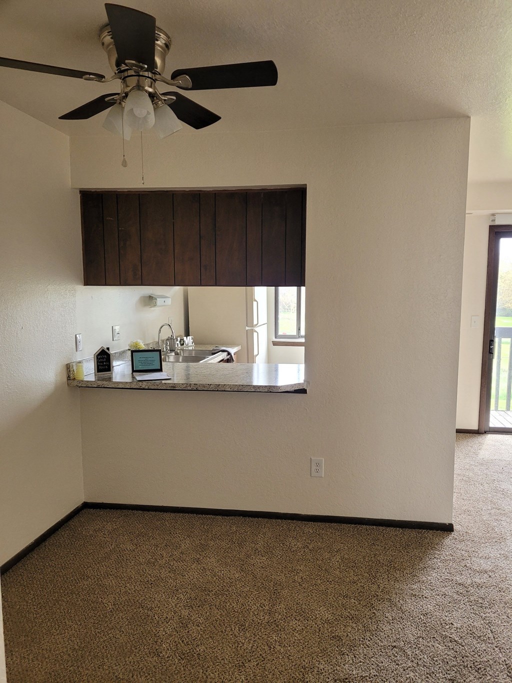 a view of the kitchen from the living room
