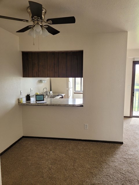 a view of the kitchen from the living room