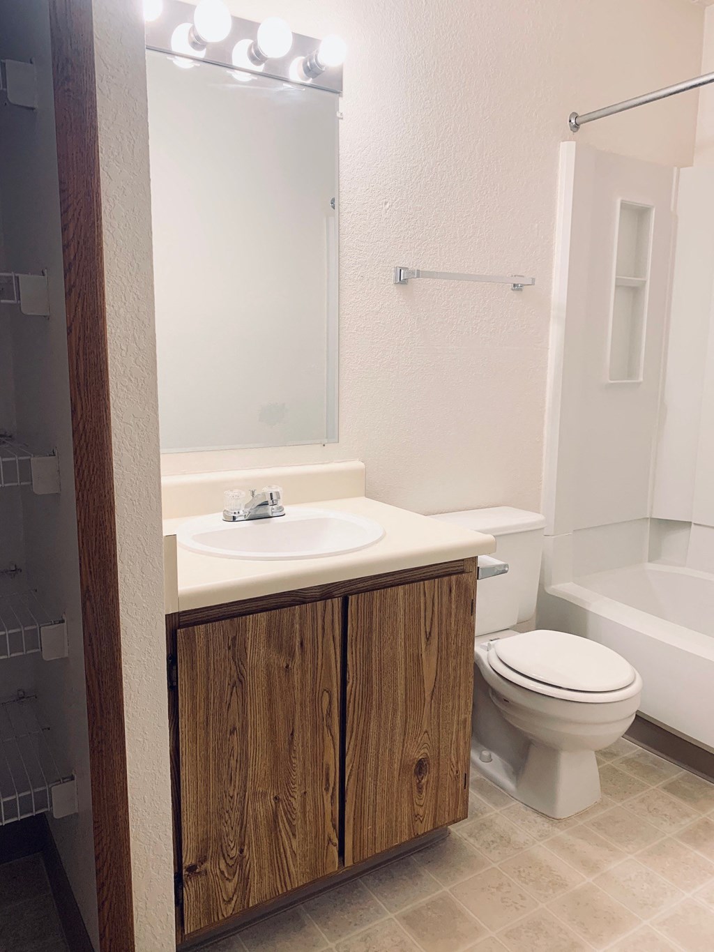 a bathroom with a sink toilet and bathtub