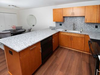 Kitchen with Tile Backsplash at Gray Estates Apartments, MRD Conventional, St Clair MI 48079