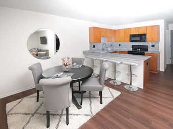 Dining Area Open Concept Dining Area at Gray Estates Apartments, MRD Conventional, St Clair MI 48079 - Photo Gallery 2