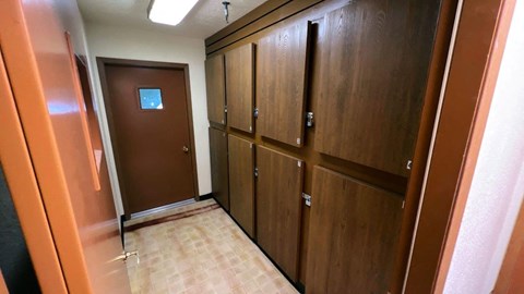 a row of lockers in a hallway of a building
