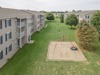Play area Exterior at Nelson Estates Apartments,1815 Raleigh Ave, Kendallville, IN 46755 - Photo Gallery 4