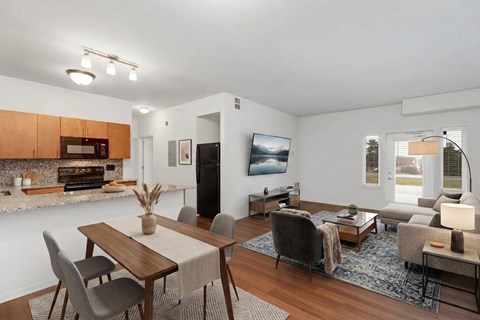 A modern dining room with a wooden table and chairs.