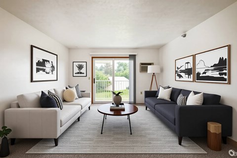 A living room with two couches and a coffee table.