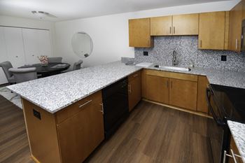 Kitchen with Breakfast Bar at Gray Estates  Apartments, MRD Conventional, St Clair MI 48079
