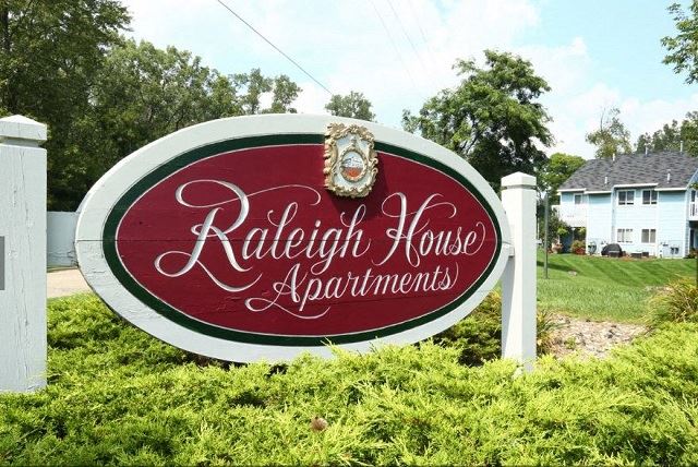 Signboard at Raleigh House Apartments, MRD Apartments, East Lansing, Michigan - Photo Gallery 1