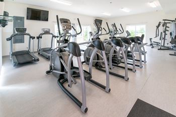 the gym has plenty of cardio equipment at the belgard apartments