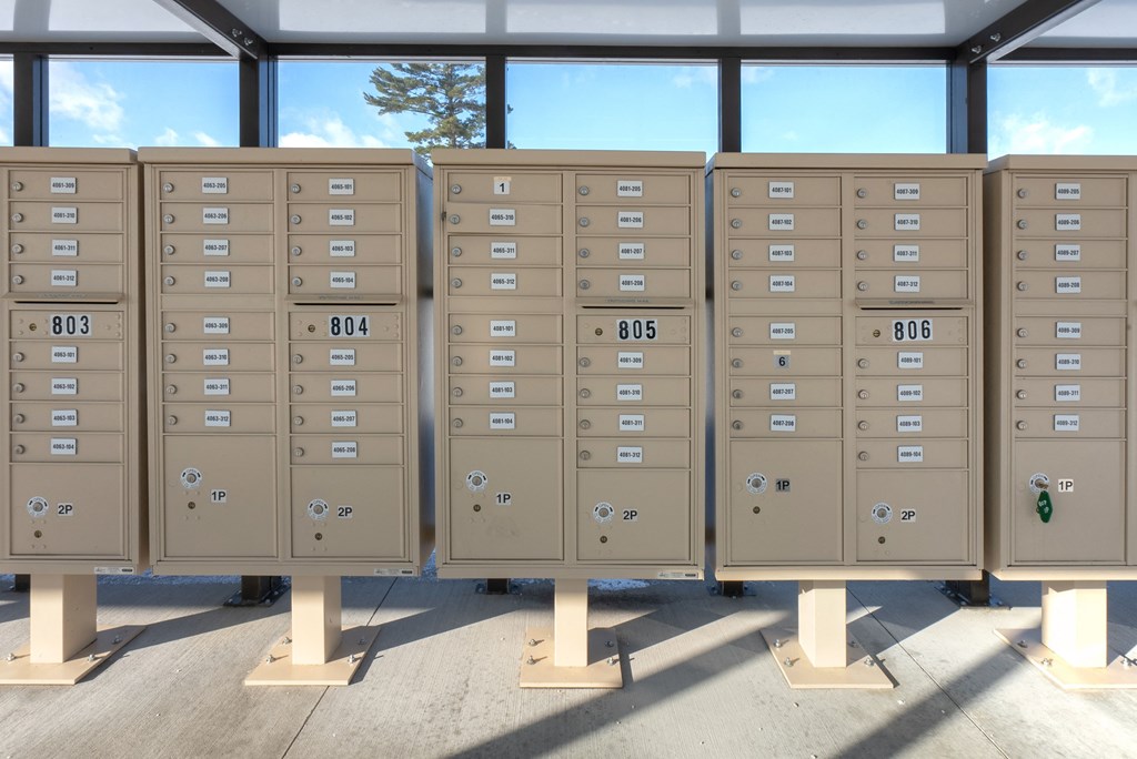 A series of mailboxes with numbers 803, 804, 805, and 806 on them.