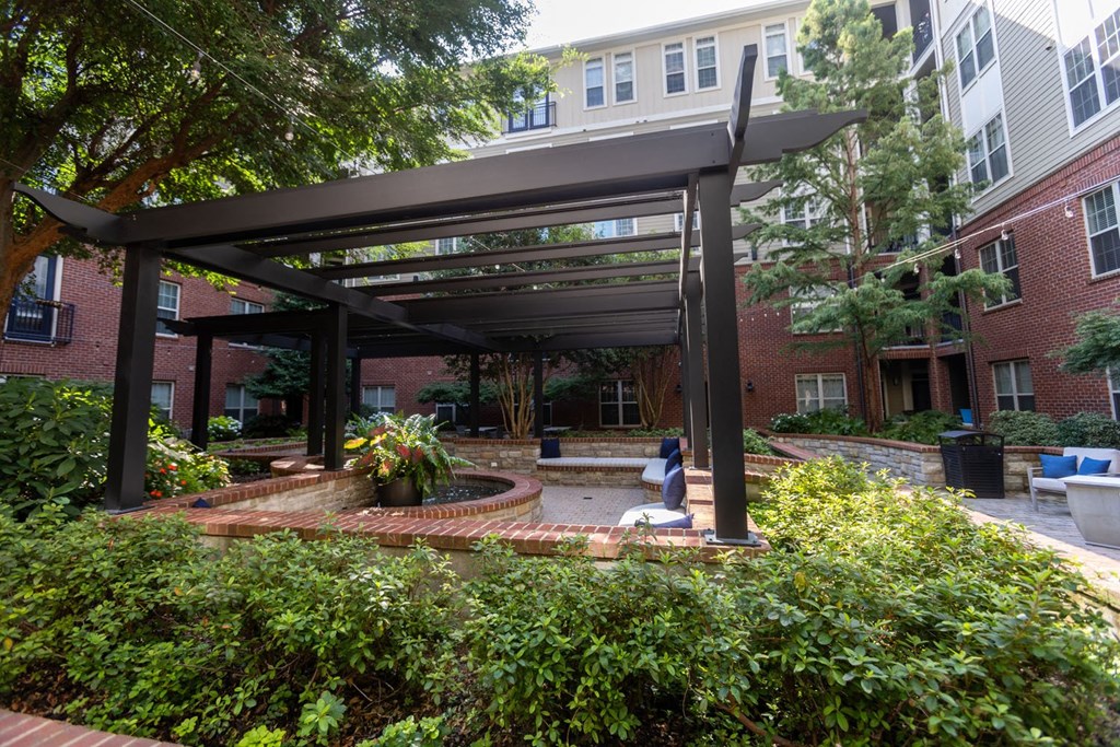 a view of a courtyard with a black structure