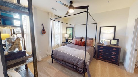 a bedroom with a bed and a dresser at Walton Fayetteville, Fayetteville, 30214