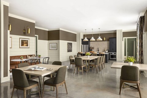 A dining room with a table set for six.