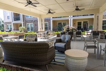 The Legacy at Walton Heights Courtyard with foundtain and outdoor seating