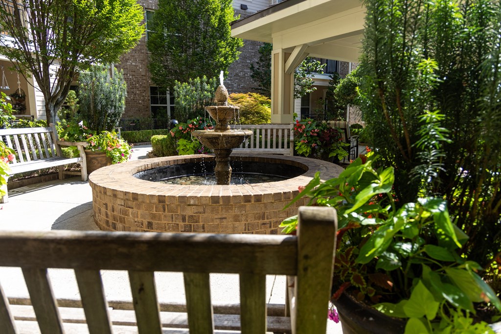 a fountain in front of a building