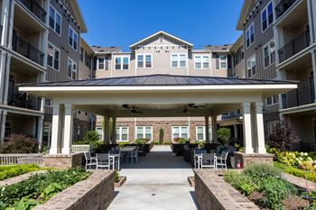 The Legacy at Walton Heights Courtyard with foundtain and outdoor seating