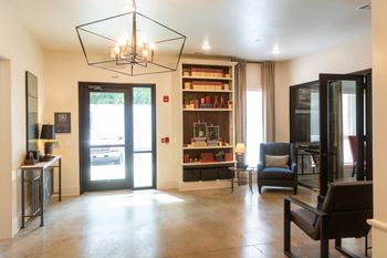a living room with a bookshelf