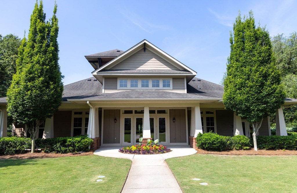 a house with a walkway in front of it
