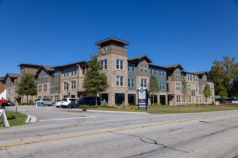 A large building with a clock tower on the top of it.