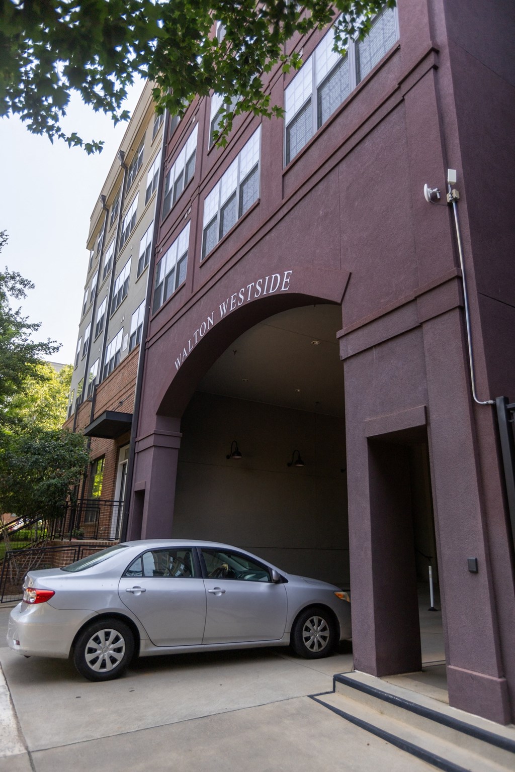 a car parked in front of a building