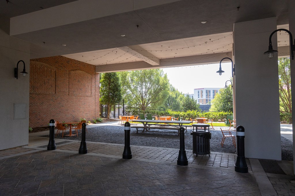 a view of the park from inside the building