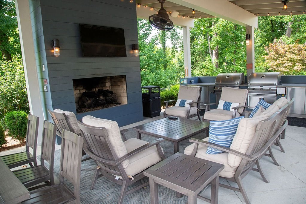 Woodstock West by Walton Apartment Homes  Outdoor Fireplace and Grills at Woodstock West by Walton, Woodstock, Georgia