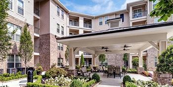 The Legacy at Walton Heights Courtyard with foundtain and outdoor seating