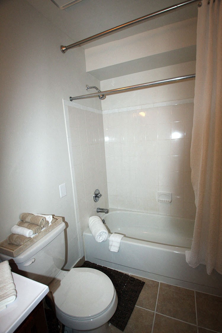 Bathroom With Bathtub at Brookwood at Ridge, New York